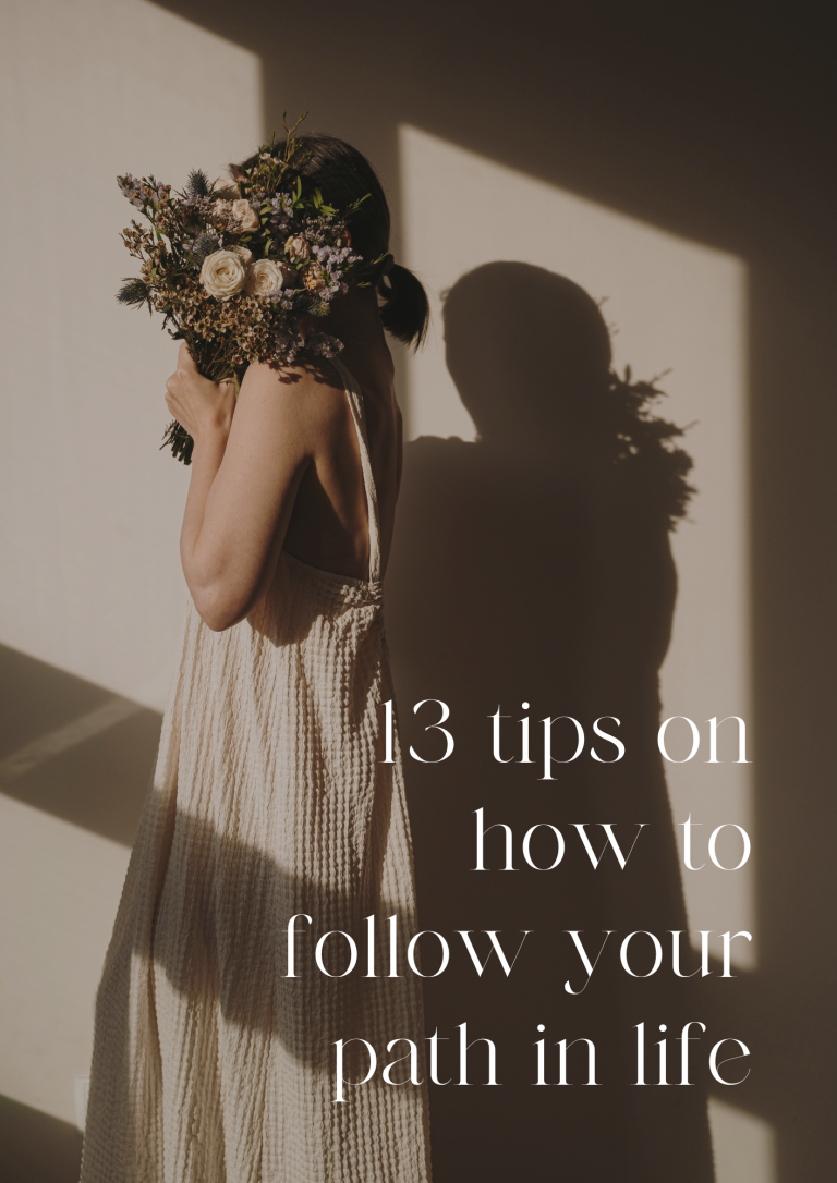 girl holding flowers in front of her head with a text written "13 tips on how to follow your path in life" in the right corner